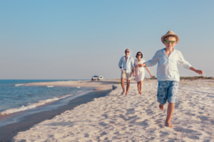child walking on the beach. scheudle your orthodontic evaluation shirley, ny